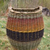 Curved tall basket by Hanna Van Aelst